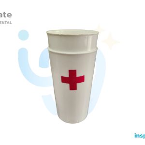 Vaso blanco para residuos con cruz roja sobre placa Inspírate con Gaucho Dental
